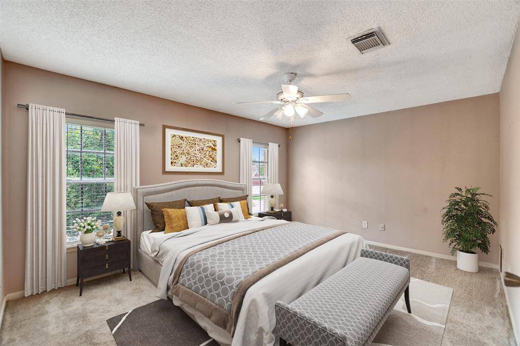 Virtually staged primary bedroom