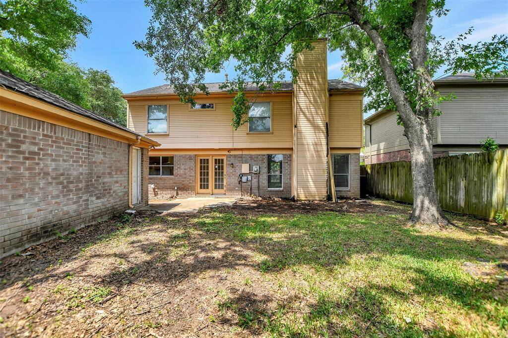 The view of the back of the home, and a great patio space!
