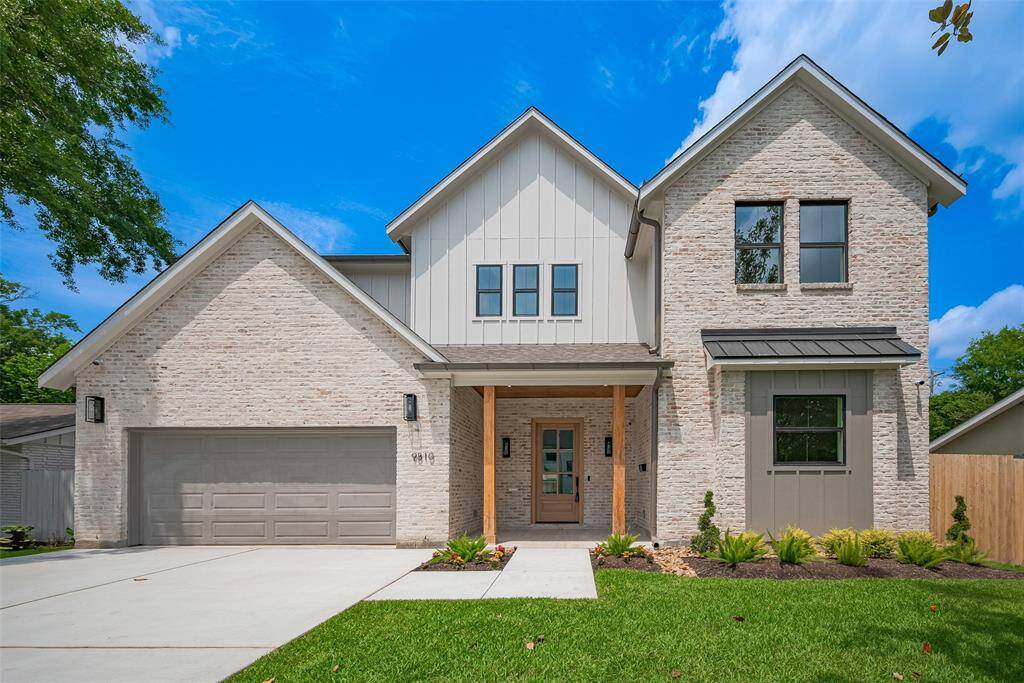 The German smear finish on brick and custom milled oak columns are unique features to this home