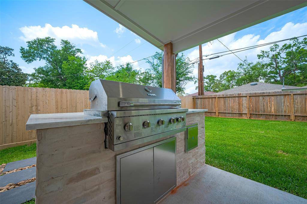 Outdoor kitchen with gas grill