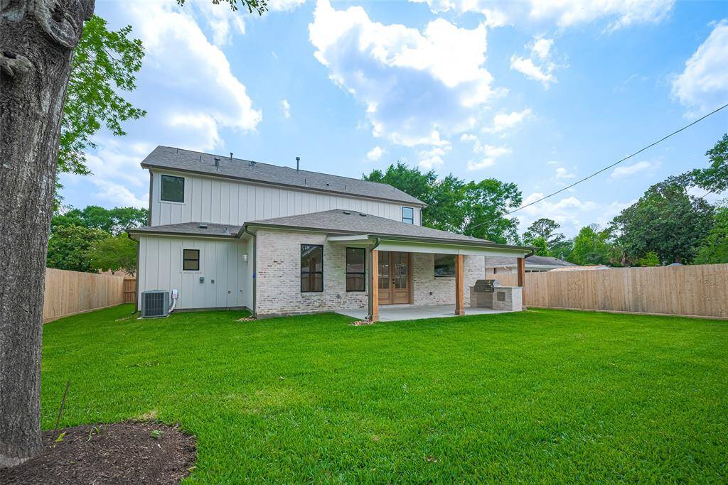 Backyard is large with clearance for a pool