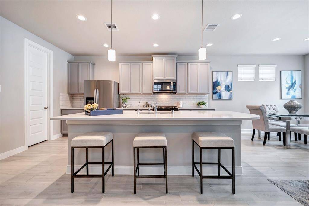 Another angle of the kitchen and dining.