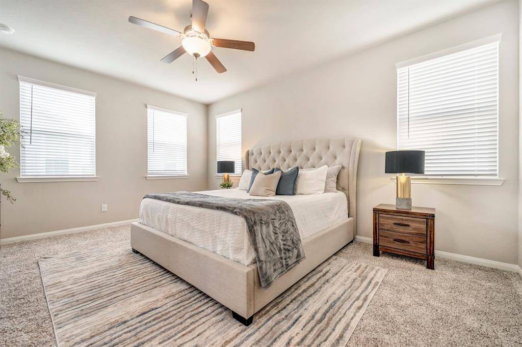 This inviting space has ample natural light and a walk-in closet with tons of storage.