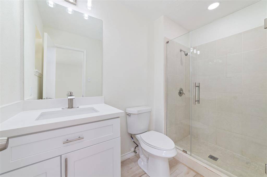 Renovated bathroom with a standing shower