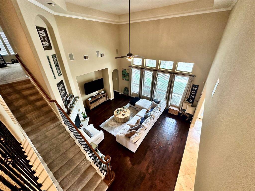 Discover your dream home at 10314 Hatcher Drive. This stunning residence features elegant brick and stone exteriors, a spacious two-car garage, and lush landscaping. Ideal for modern living, this property offers both comfort and style. Don’t miss this exceptional opportunity!