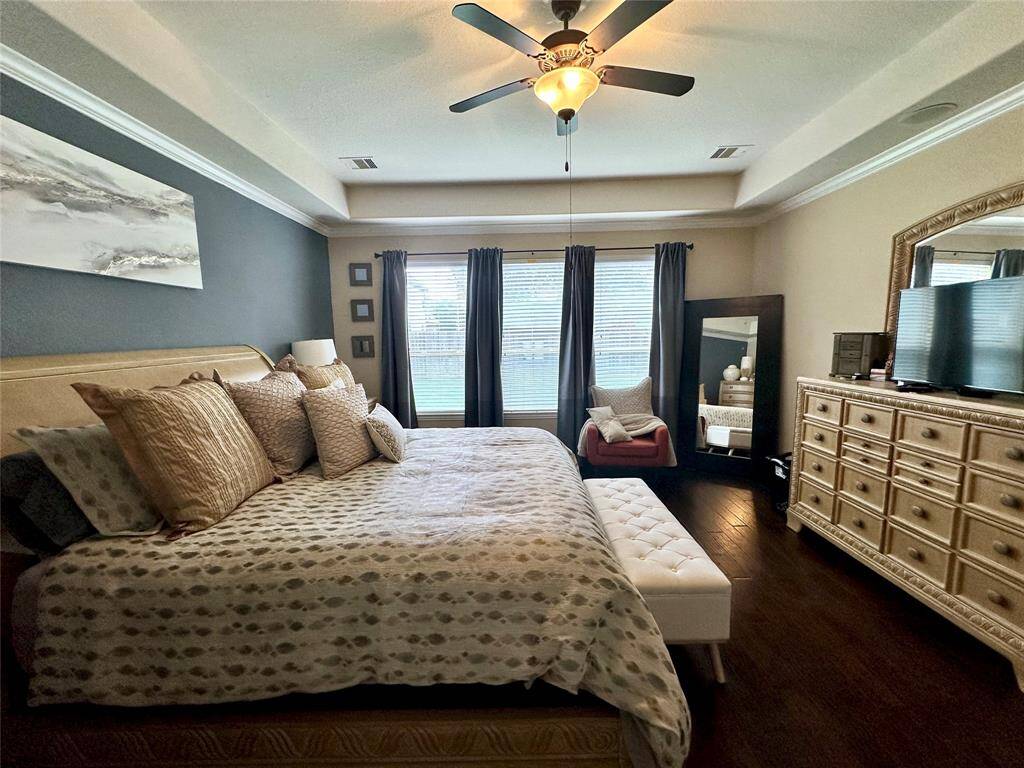 Discover your dream home at 10314 Hatcher Drive. This stunning residence features elegant brick and stone exteriors, a spacious two-car garage, and lush landscaping. Ideal for modern living, this property offers both comfort and style. Don’t miss this exceptional opportunity!