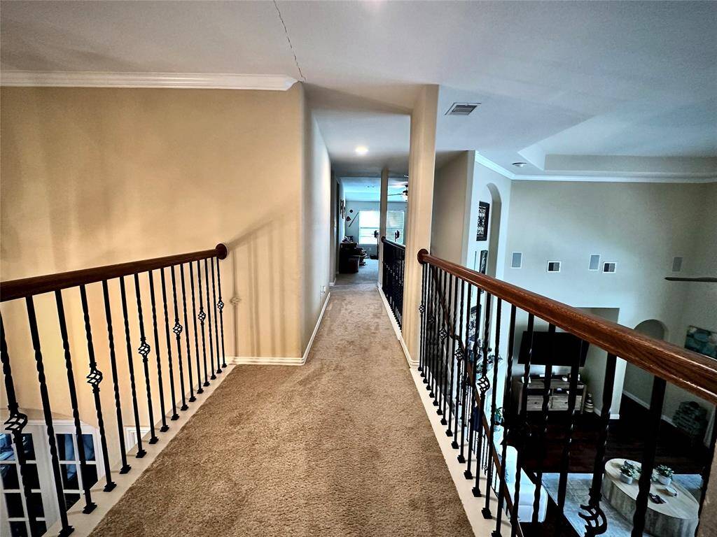 Discover your dream home at 10314 Hatcher Drive. This stunning residence features elegant brick and stone exteriors, a spacious two-car garage, and lush landscaping. Ideal for modern living, this property offers both comfort and style. Don’t miss this exceptional opportunity!