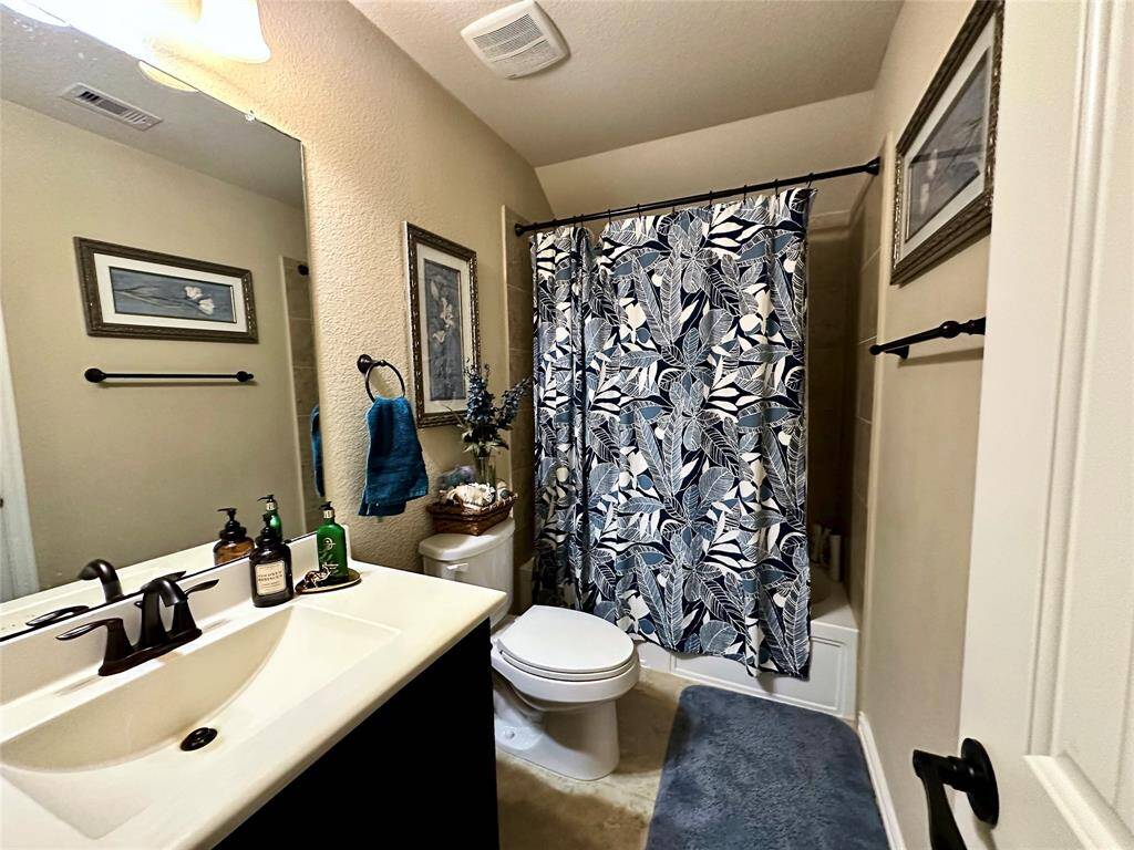 Discover your dream home at 10314 Hatcher Drive. This stunning residence features elegant brick and stone exteriors, a spacious two-car garage, and lush landscaping. Ideal for modern living, this property offers both comfort and style. Don’t miss this exceptional opportunity!
