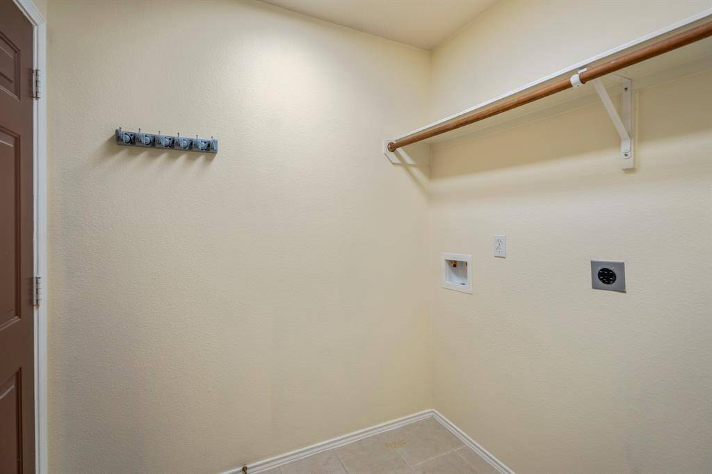 The utility room has gas and electric hook-ups for your appliances.