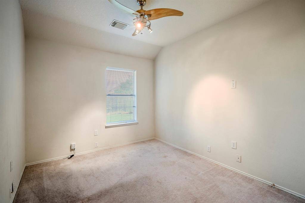 One of the secondary bedrooms that was previously used as an office.