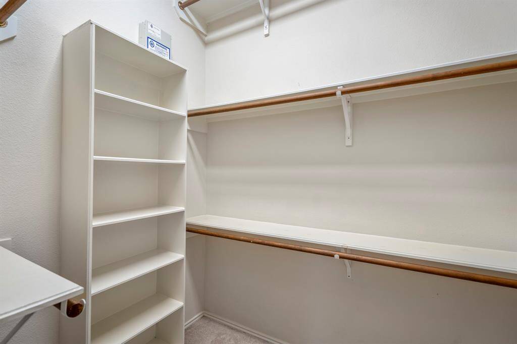 The primary closet with built-ins.