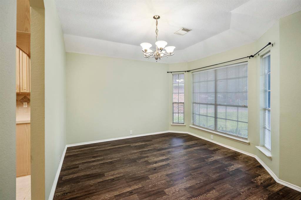 The dining room, with a large bay window.