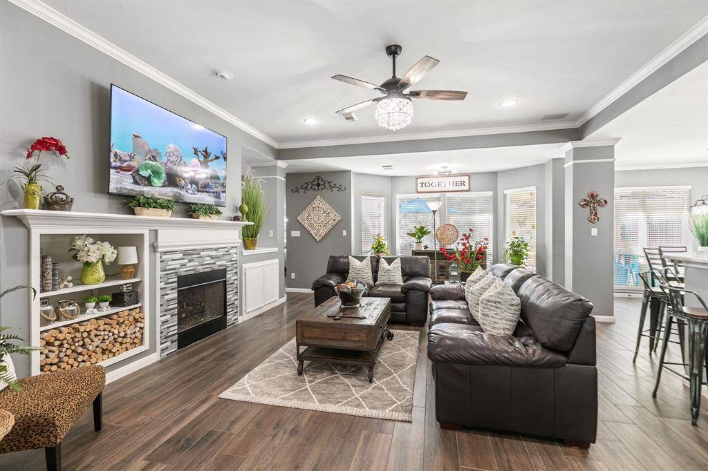 Your family gathering space! The room arrangement works well for entertaining or for everyday family comfort.