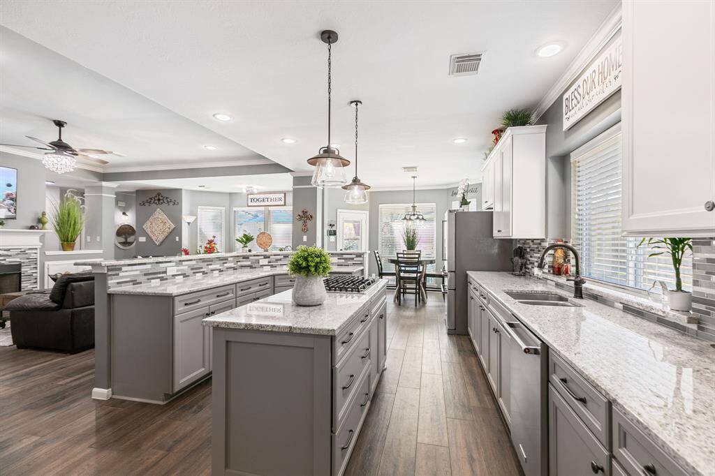 Views overlooking the backyard and pool area will not disappoint.