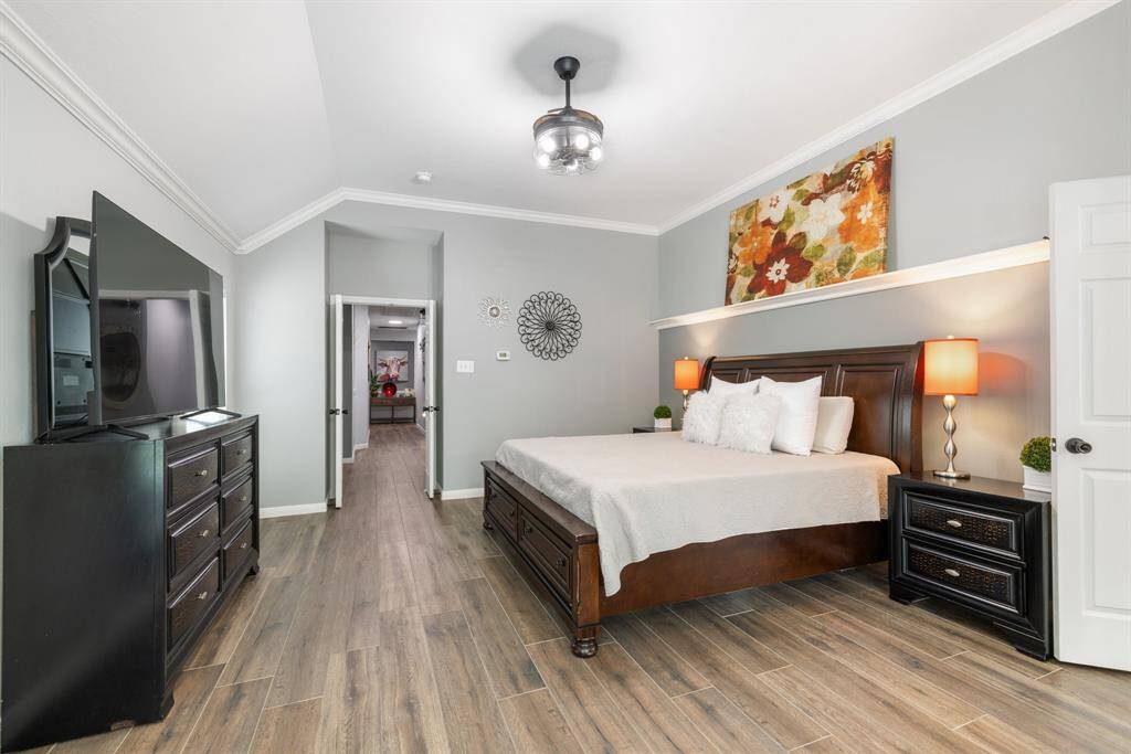 Another view of the primary bedroom from a different perspective.