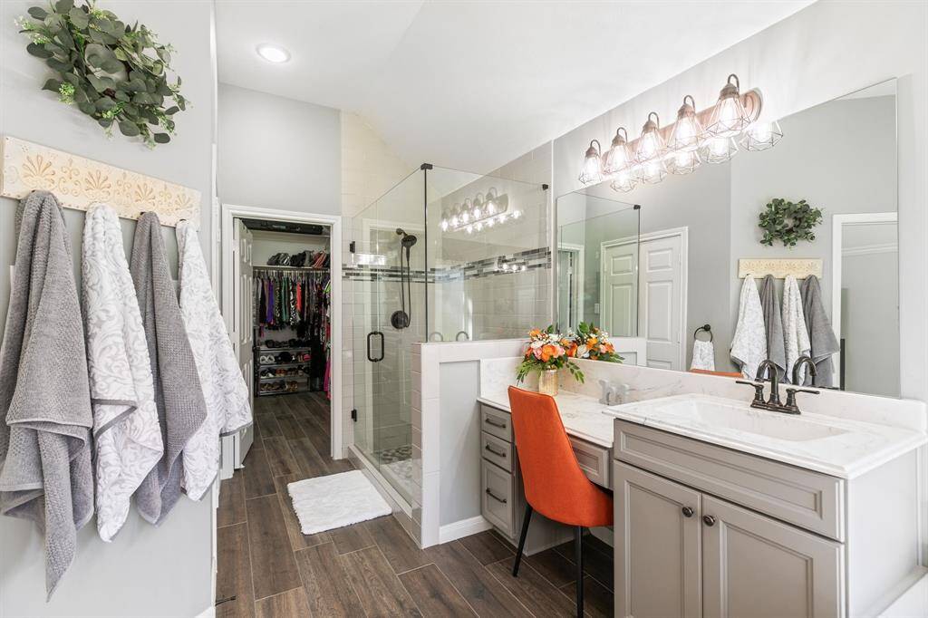 A view of the primary bathroom from another angle.