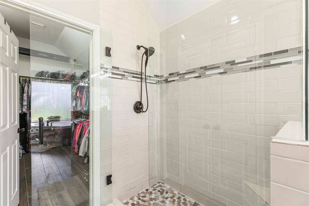 A view of the oversized walk in shower.