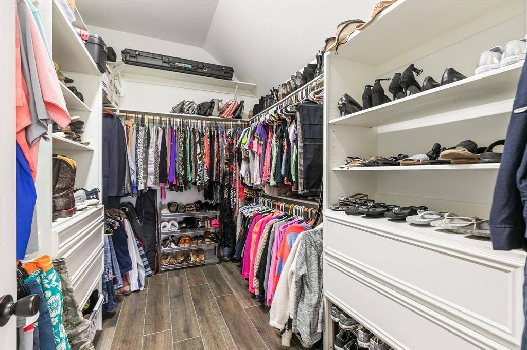 Impressive large walk in closet.