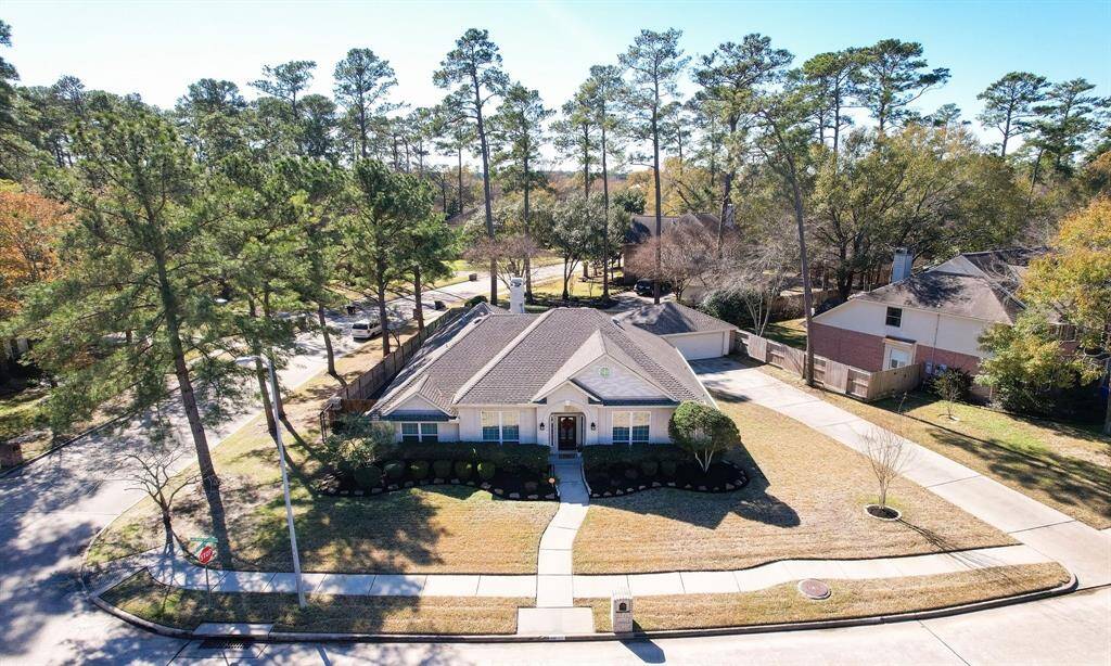 Home management is eased with abundant cabinet and closet storage, security system, low maintenance brick exterior a two car garage.