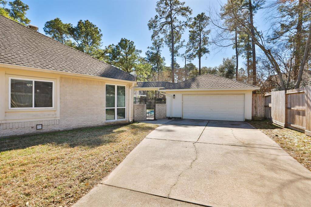 Oversized two car detached/attached garage with extra space and garage door opener.