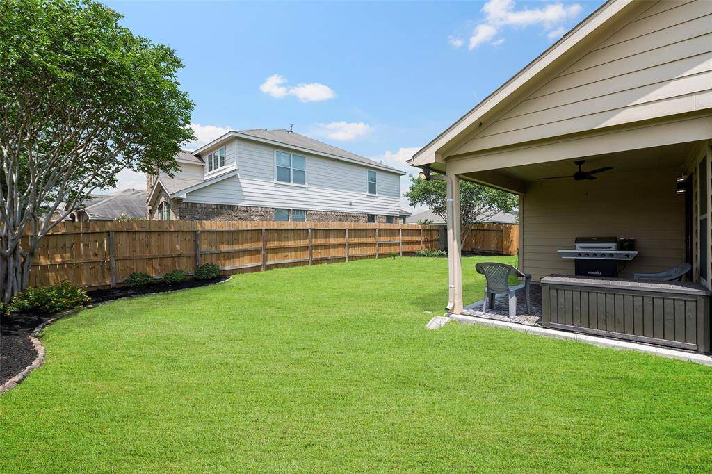 and large, very nicely landscaped and maintained backyard