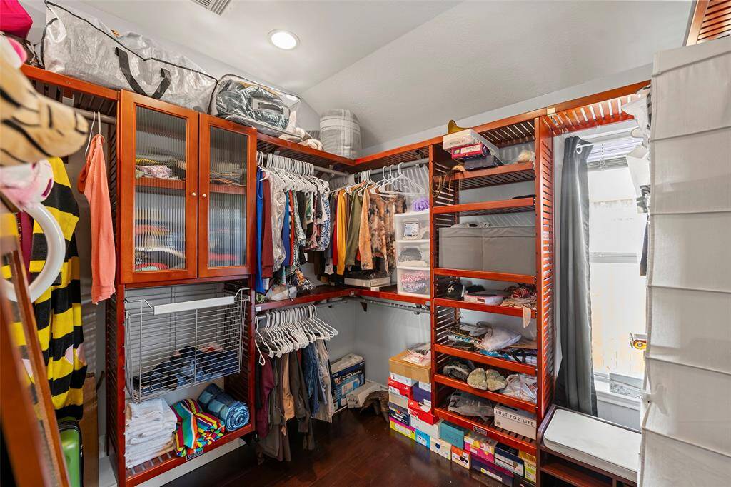 And the originally 4th bedroom turned into a custom designed organized walk-in closet