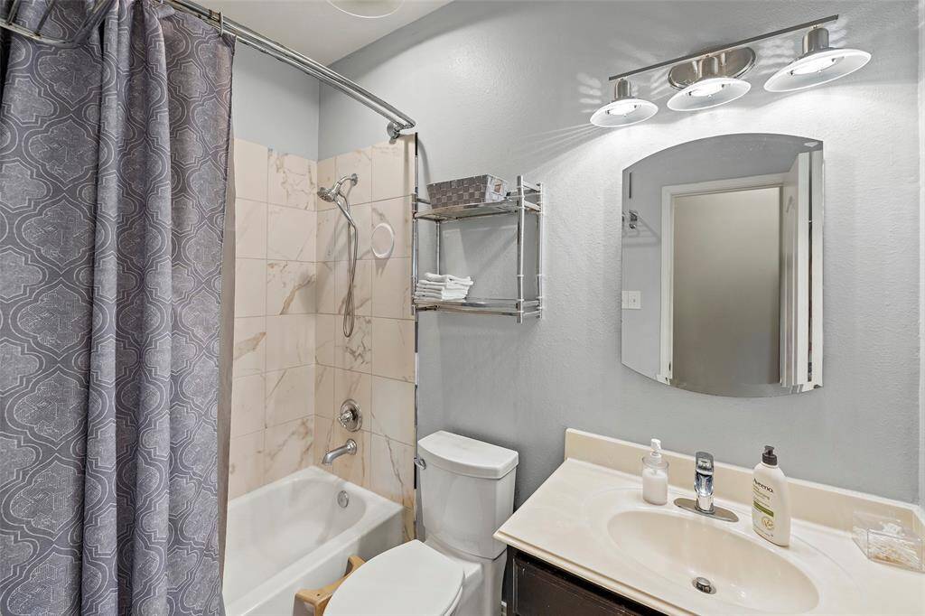 The second bathroom also functions as guest restroom