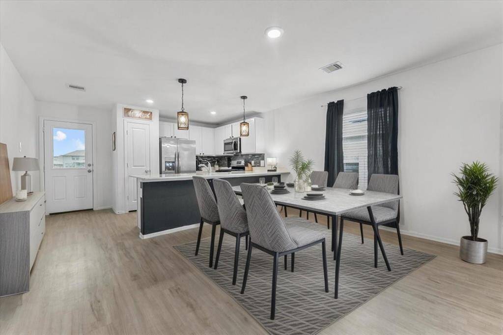 Welcome to 126 Spring Rose, where fresh curb appeal meets comfortable living. The home features brand-new sod in the front yard, creating a lush, green lawn that enhances the property’s charm and invites you to enjoy the outdoors