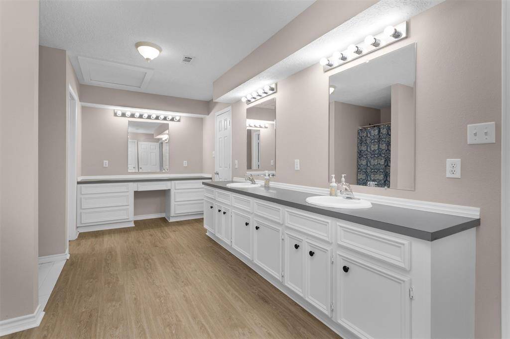 Primary his & her sinks.