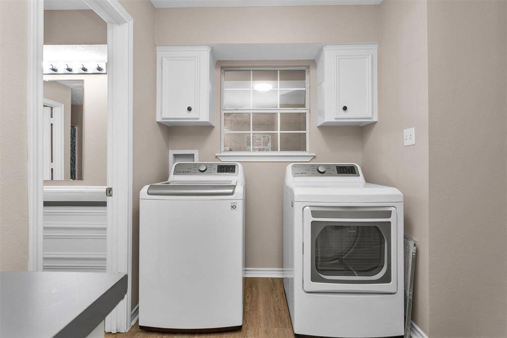 Laundry room with washer and dryer.