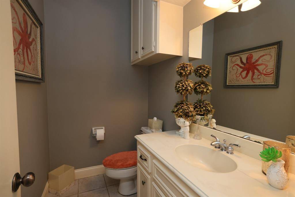 Half bathroom adjacent to living room