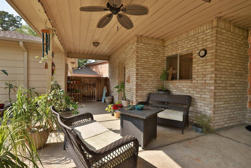 Charming covered patio accessible from the family room and kitchen
