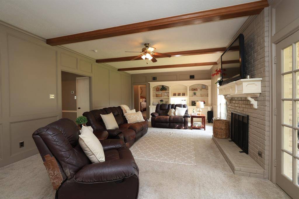 Family room with wood beams