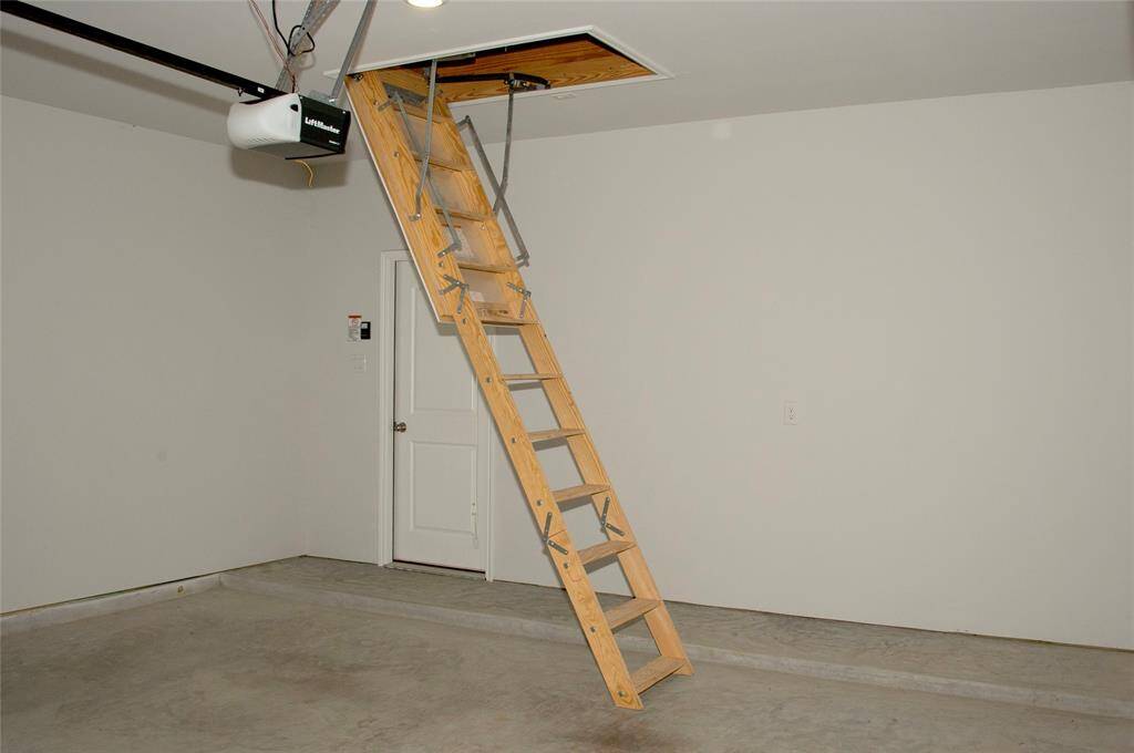 GARAGE DOOR OPENER included in this 2 car garage space.  Attic entry in the garage for storage of seasonal items.  1730 CINDY LANE.