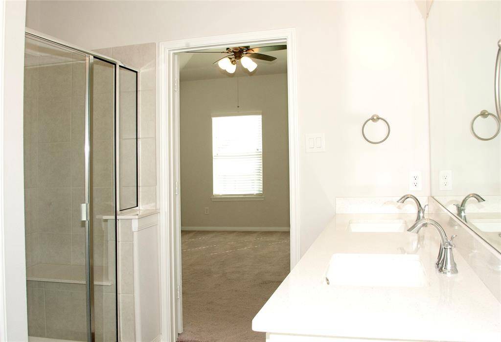 Ensuite Bath includes Separate Shower and Soaking tub, dual sinks and roomy closet at 1730 Cindy Lane.