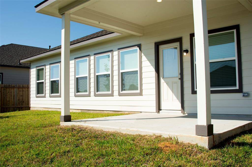 Covered patio is a great place to enjoy your view from the back yard.  1730 Cindy Lane.