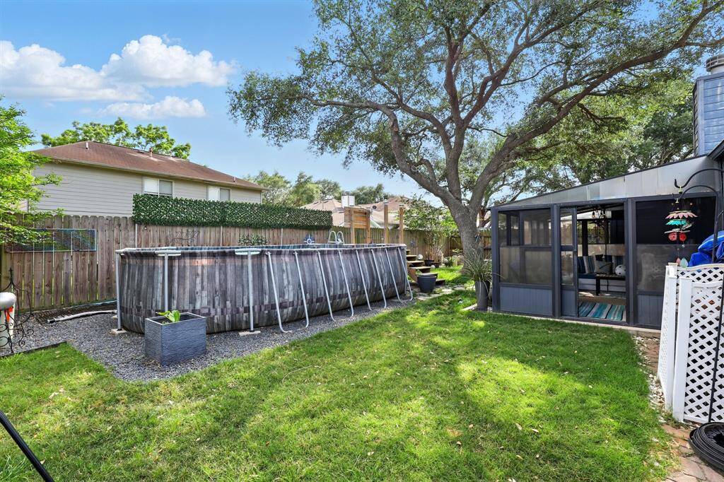 Dive into relaxation! Enjoy sunny days and refreshing swims in your private pool — the perfect backyard oasis for entertaining or unwinding.