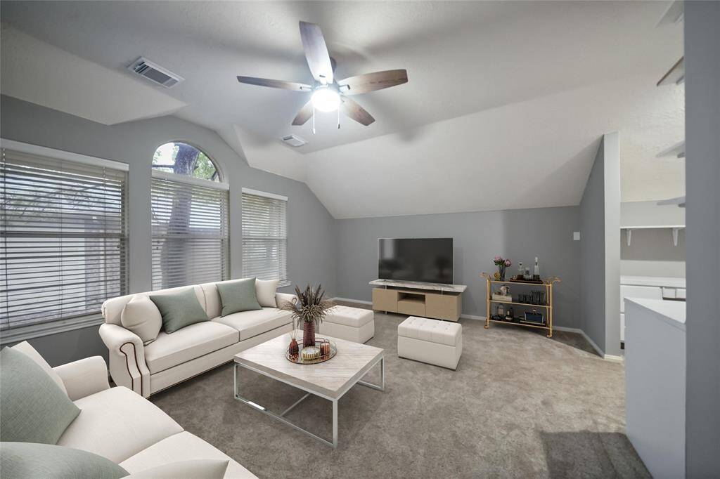 Large game room located upstairs can also be used as a Den "Virtually Staged".