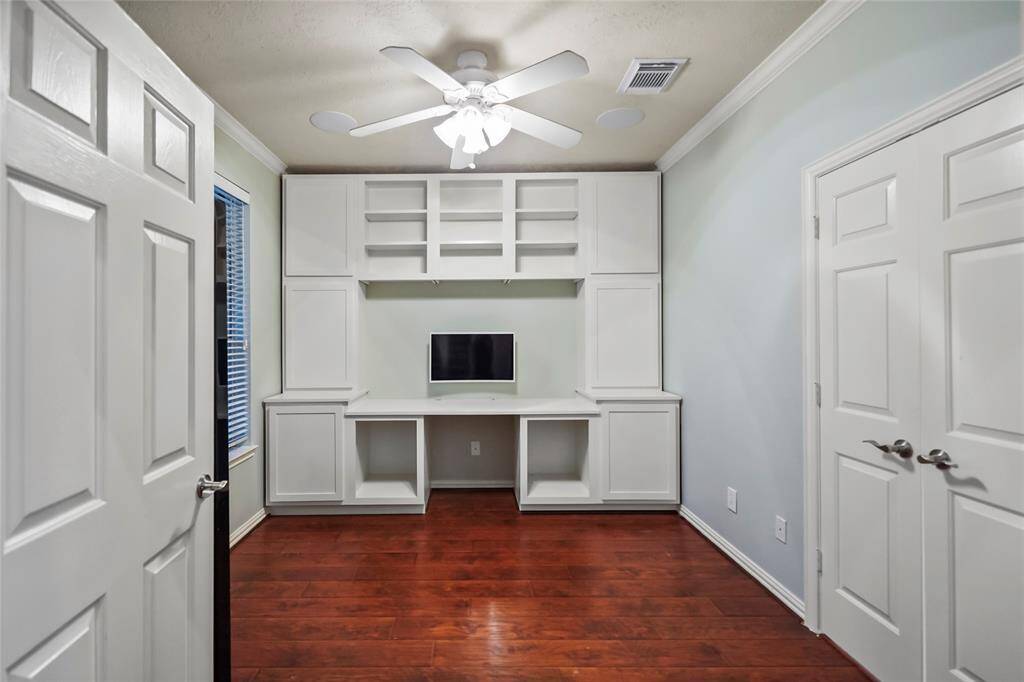 Wonderful private study with built in cabinets and desk,