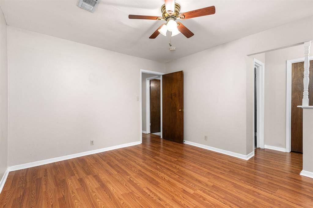 The primary bedroom will accommodate large bedroom furniture and features an en-suite bath.