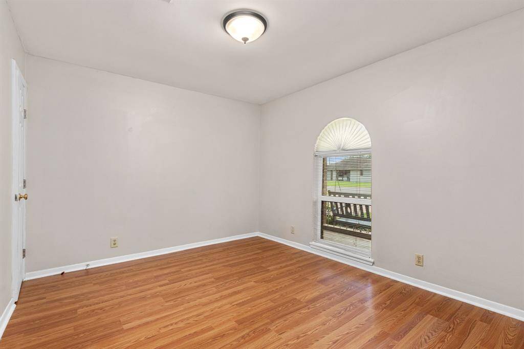 The space off the entry can be used as a home office/study, extra living space, exercise/play room or any other use that fits your lifestyle. Note the new paint and beautiful floors.