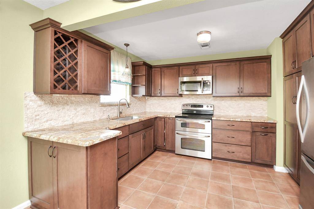 Seamless flow from the kitchen to the dining area for effortless entertaining.