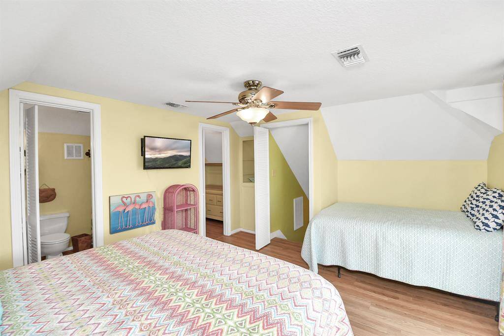 Cozy upstairs bedroom with en-suite bath, perfect for relaxation and privacy.