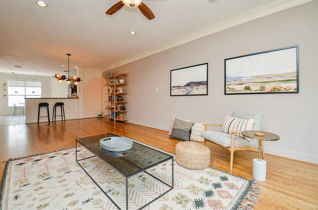 The area, up left center, under the chandelier, might be a great spot for dining table, if desired.
