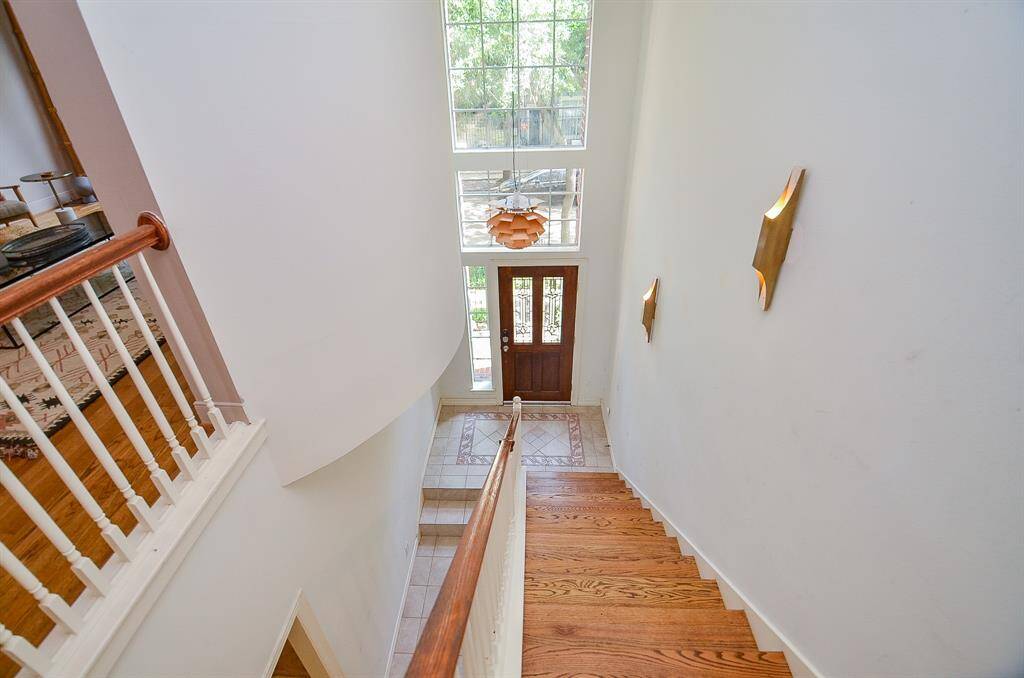 What a marvelous open view of the staircase and main entry from the 2nd floor landing.