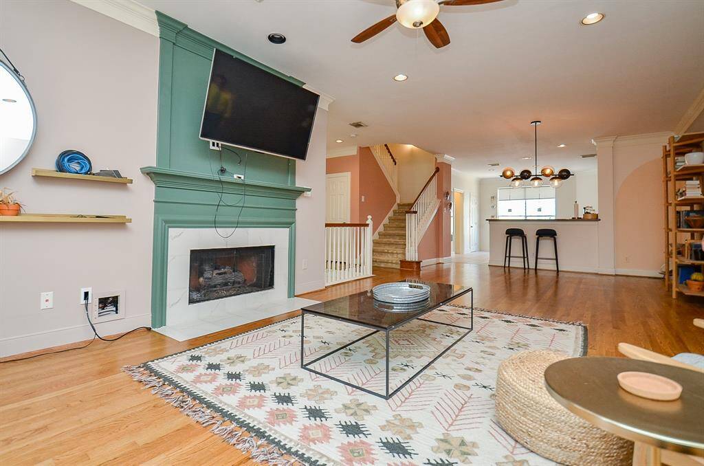 Imagine this stunning space filled with family and friends at holiday time, gathered around a warm, glowing fire. Straight ahead, is a full chef's kitchen.