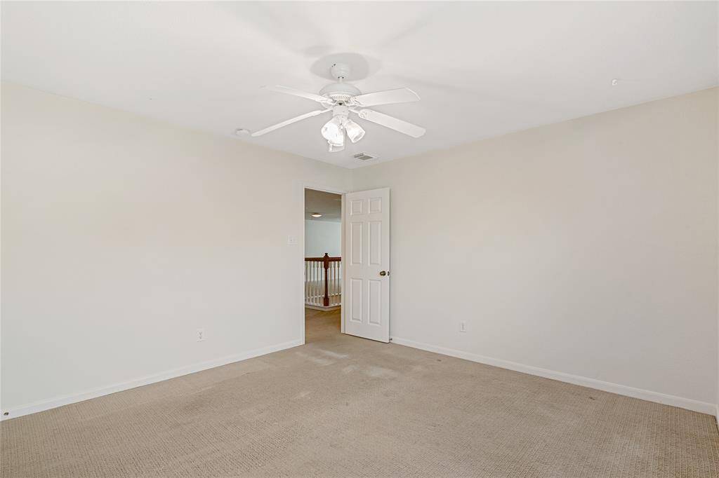 Another upstairs bedroom just off the gameroom.