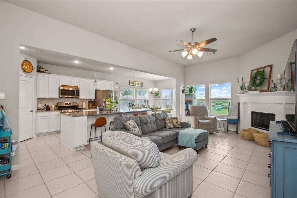 Open kitchen and living space with fireplace
