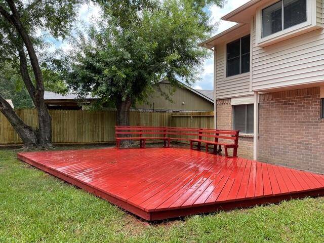 Large wood deck and built-in seats.