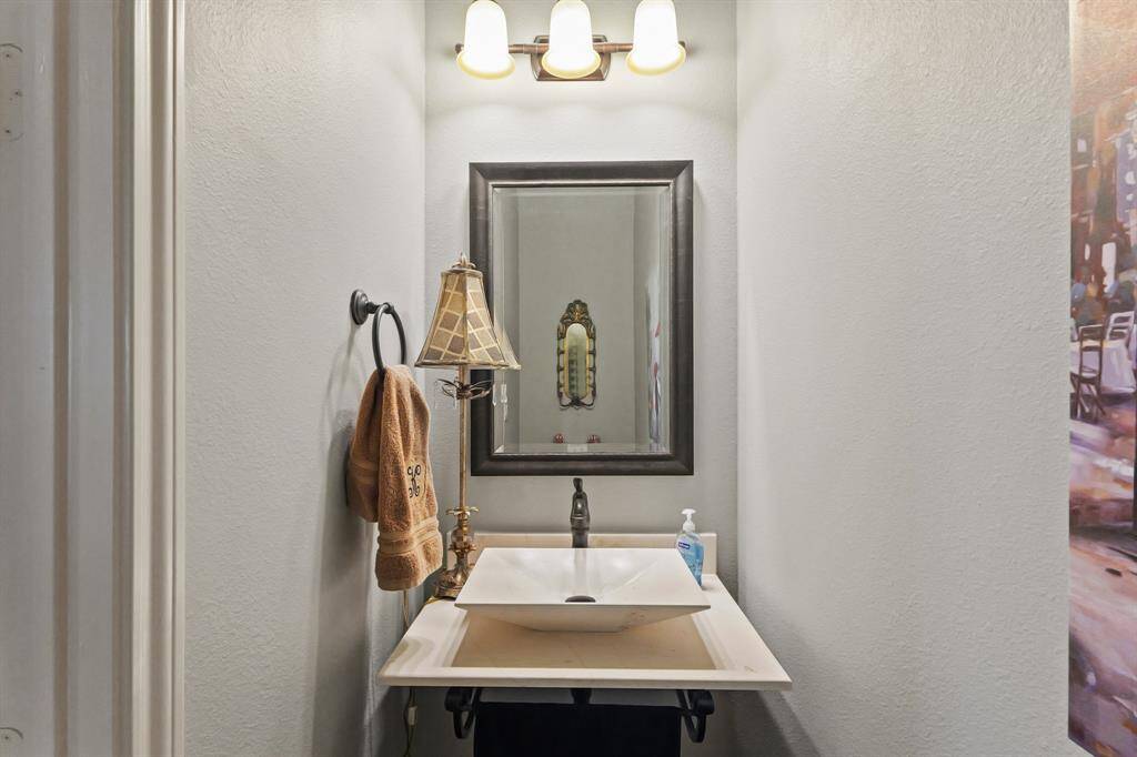Half Bath just off the foyer entrance fo easy access by guests.